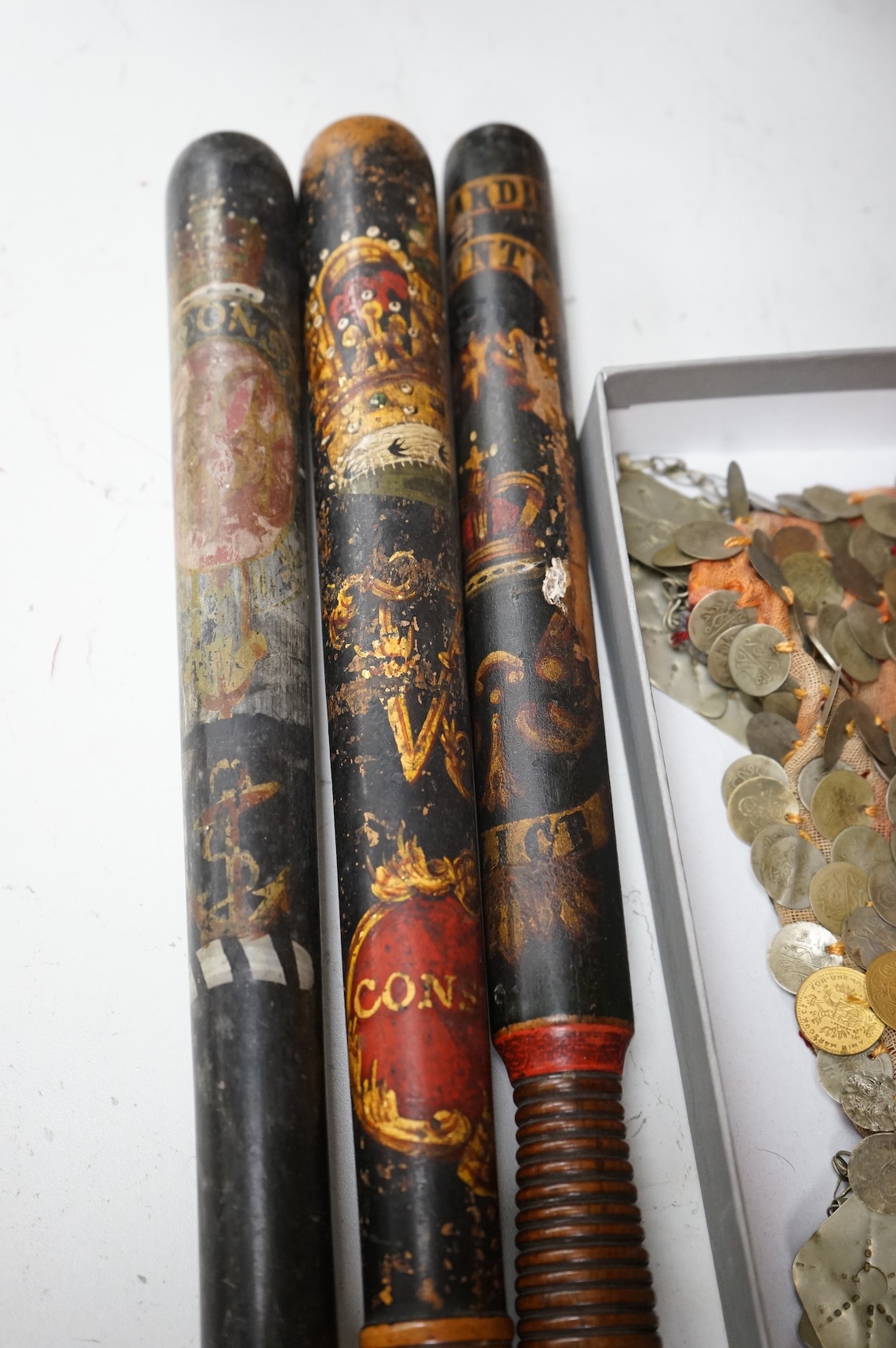 A Victorian Scottish Special Constable’s turned and painted wood truncheon, and two other Victorian Police truncheons, largest 46cm in length (3)